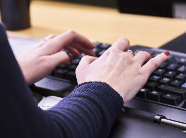 Hands on a keyboard